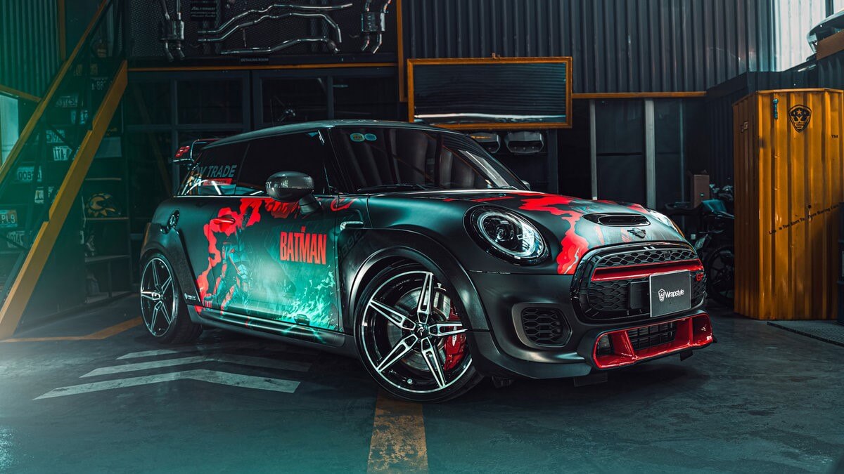 a mini cooper batman style vehicle wrap