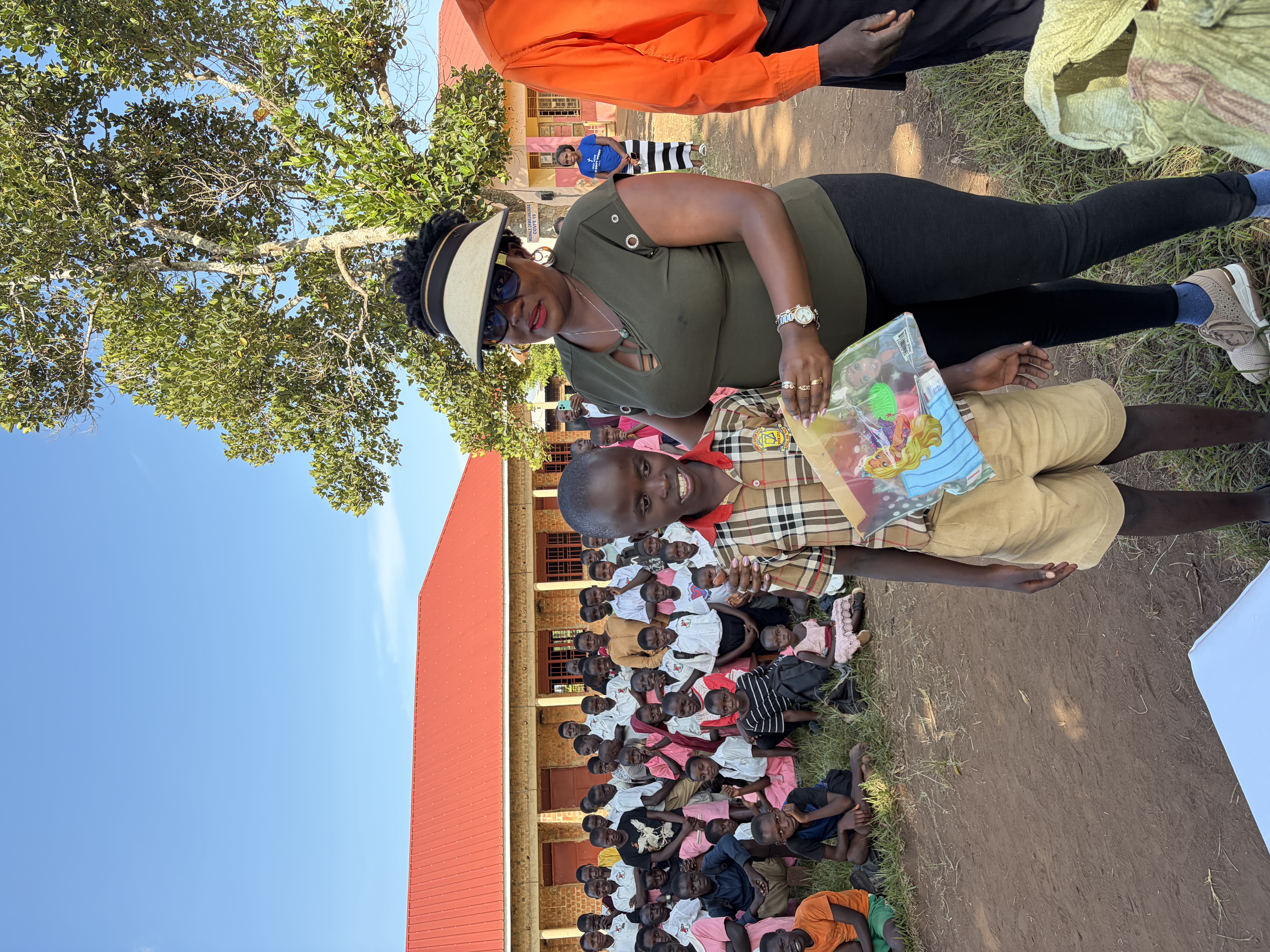 Learner receiving a kit with a lady assisting