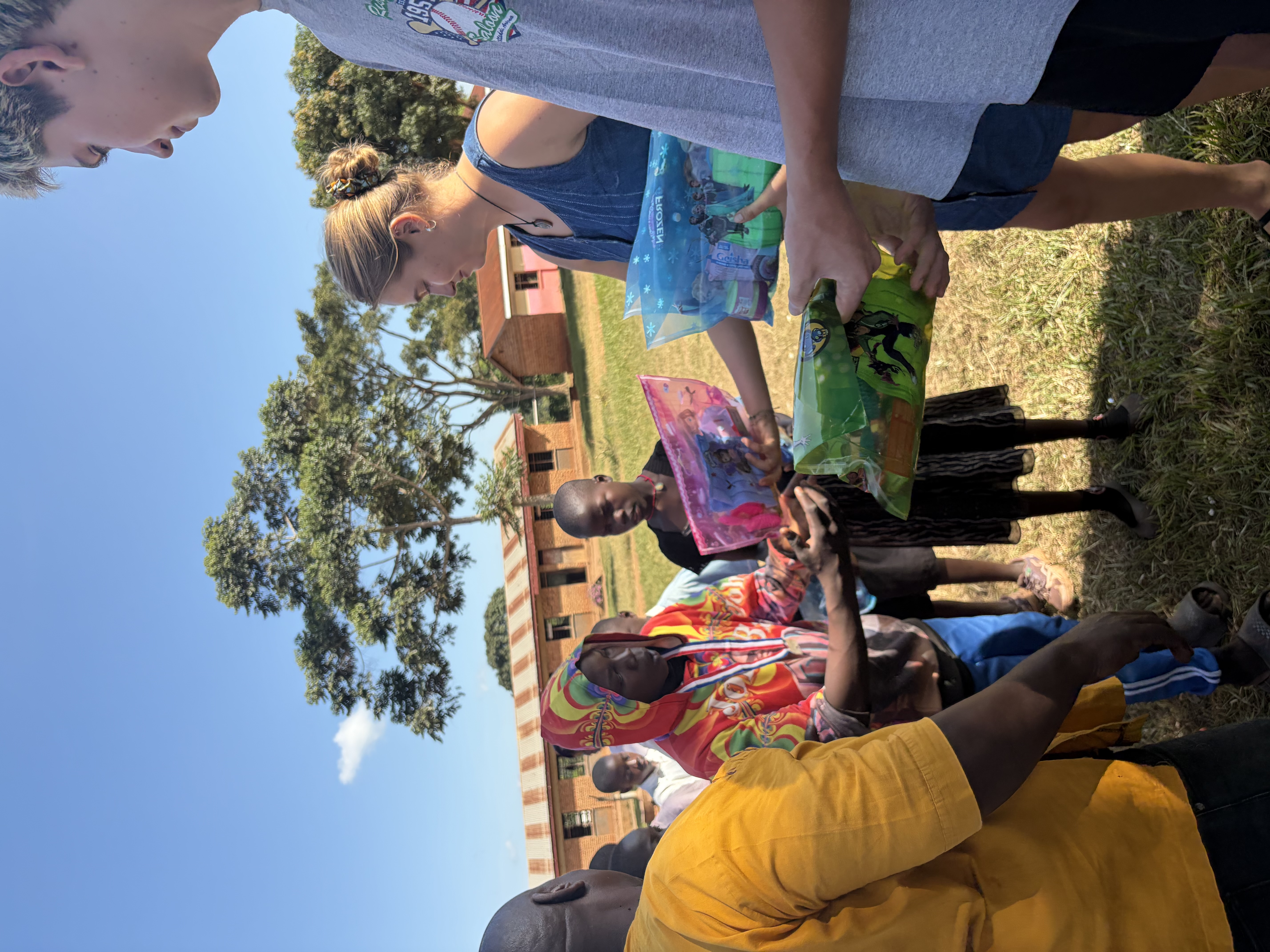 Volunteers handing out kits to learners